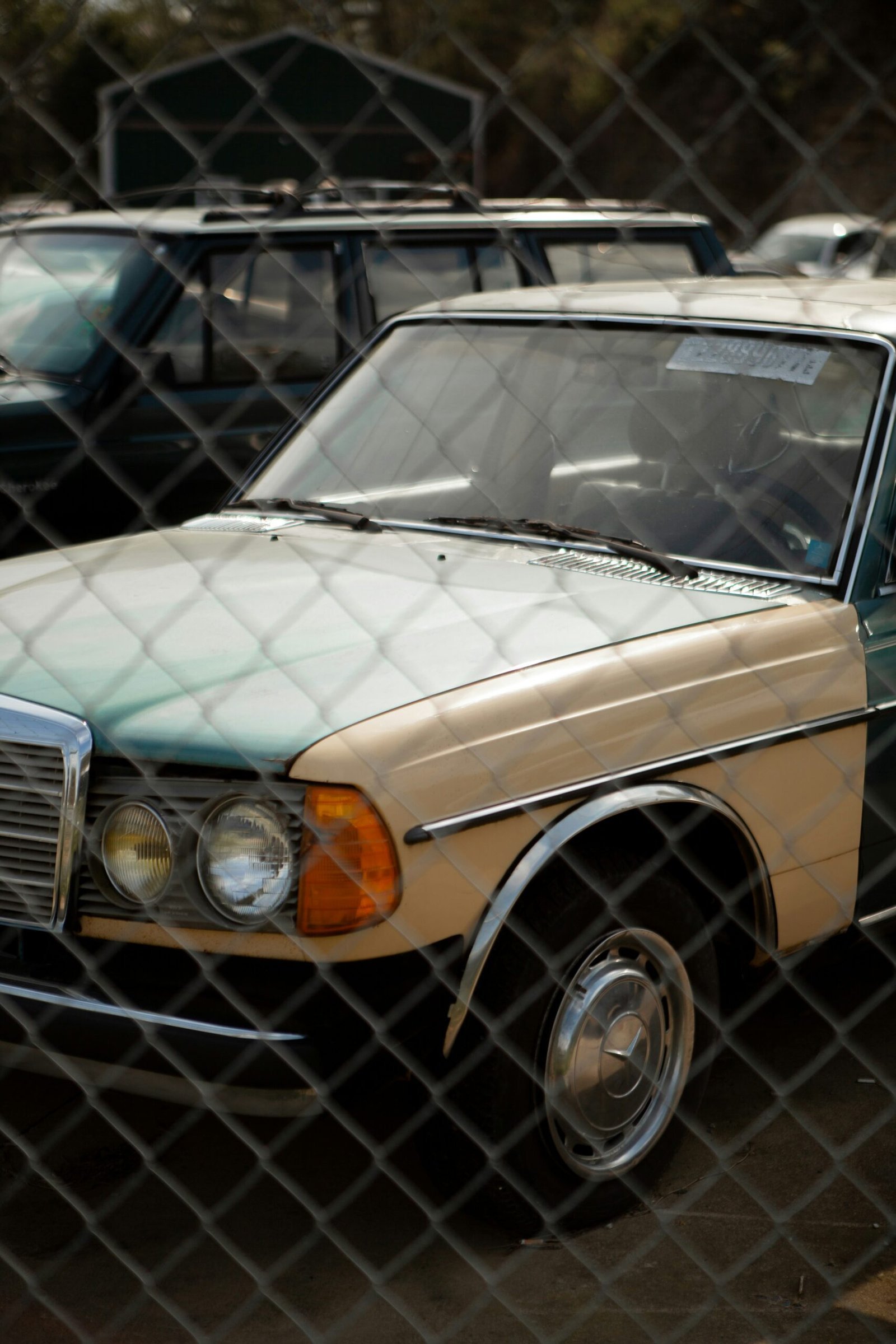 white mercedes benz car in a parking lot